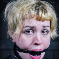 Elizabeth Thorn is dungeon bound in leather with girlfriend Deli