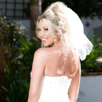 Blonde babe Lexi Lowe showing off nice MILF tits outdoors in wedding dress