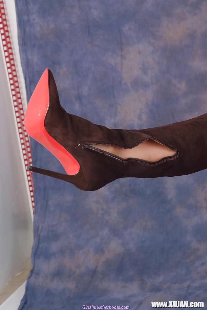 Busty blonde Lucy Zara removing long suede boots and exposing pussy - Photo #1721970