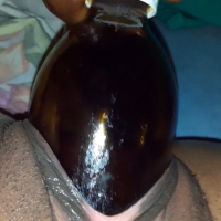 Big pussy teen taking two different sizes of bottles inside her pussy