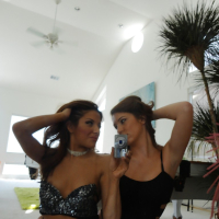 Young lesbians Maddy Oreily and Evilyn Fierce kiss and hug passionately