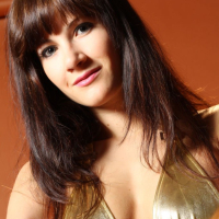 Babe Lauren Crist takes off her sexy gold Bodysuit