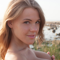 Beach babe Viola Bailey flaunting large all natural teen tits outdoors