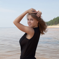 European beach babe Viola Bailey baring large teen tits for glamour shoot