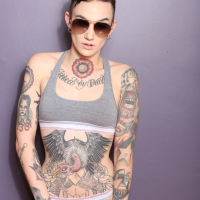 Inked and hot Babe Nikki Hearts gets to strip down