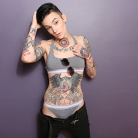 Inked and hot Babe Nikki Hearts gets to strip down