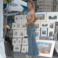 Sensual blonde Shelby Bell posing outdoors in blue jeans