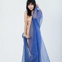 Pretty girl Zelda B displays her naked body in Awan