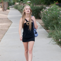 Blonde teen Sara James shows off her pussy in public