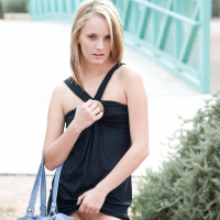 Blonde teen Sara James shows off her pussy in public