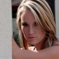 Pics of Sara James slipping out of her bikini outside
