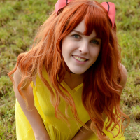 Amarna Miller poses in a beautiful yellow dress while outside