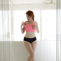 European babe Amarna Miller is posing and then undressing sexy