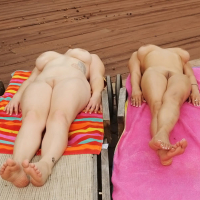 Holly Brooks and Aurora Rose share cock