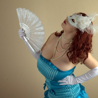 Busty Samanta Lily packs her massive boobs into a sexy mask costume