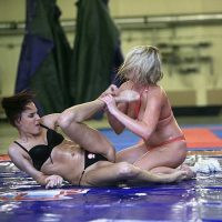 Lyen Parker in domination wrestling with lesbian blonde Lucy