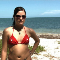 Brandi Belle plays kinky beach games