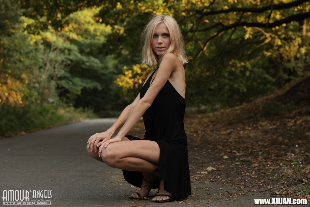 Beautiful young blond Nora Pace shamelessly strips and spreads in nature - Photo #1797365