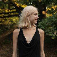 Beautiful young blond Nora Pace shamelessly strips and spreads in nature