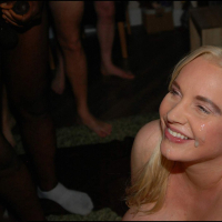 Busty blonde Jordan Pryce takes big facial from black and white cocks