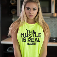 Tahlia Paris shows off her amazing boobs in a blight yellow hustle shirt