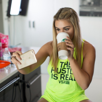 Tahlia Paris shows off her amazing boobs in a blight yellow hustle shirt
