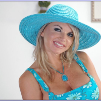 Mature wife with big tits Vicky Vette strips from a nice blue dress