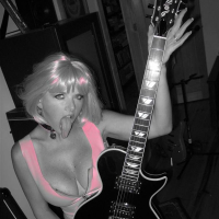 MILF Blonde Busty Babe Vicky Vette Rocks A Hot Guitar