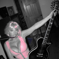 MILF Blonde Busty Babe Vicky Vette Rocks A Hot Guitar