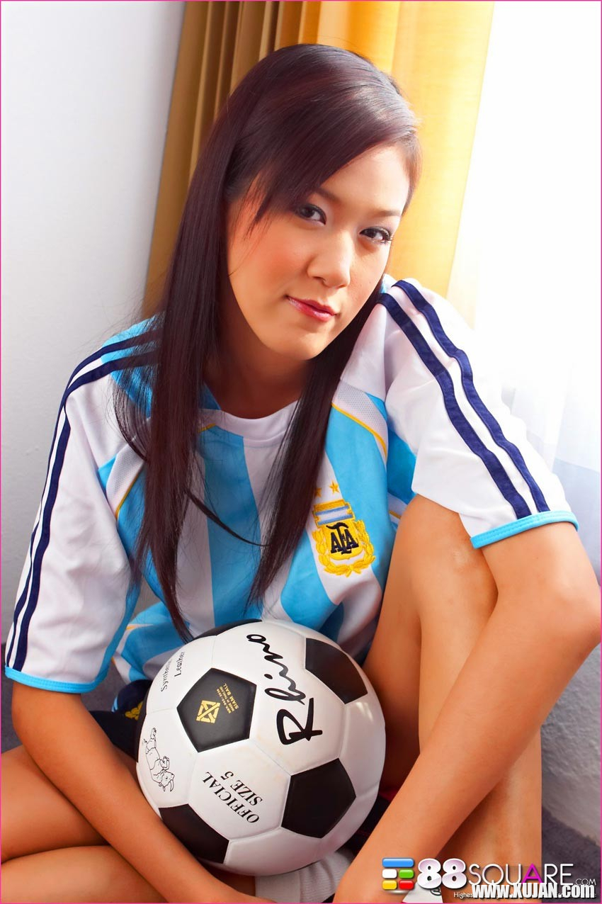 Irene Fah posing with a soccer ball - Photo #1811830