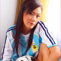 Irene Fah posing with a soccer ball