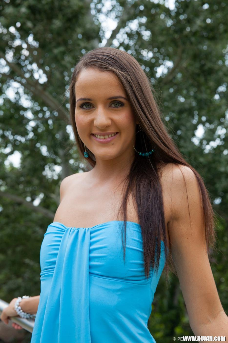 Cute girl Adriana Brill lifts up her blue dress to show her shaved pussy - Photo #1819316