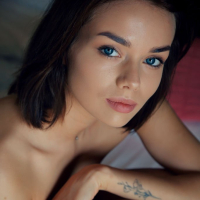 Blue eyed beauty Keira B opens her hairy pussy