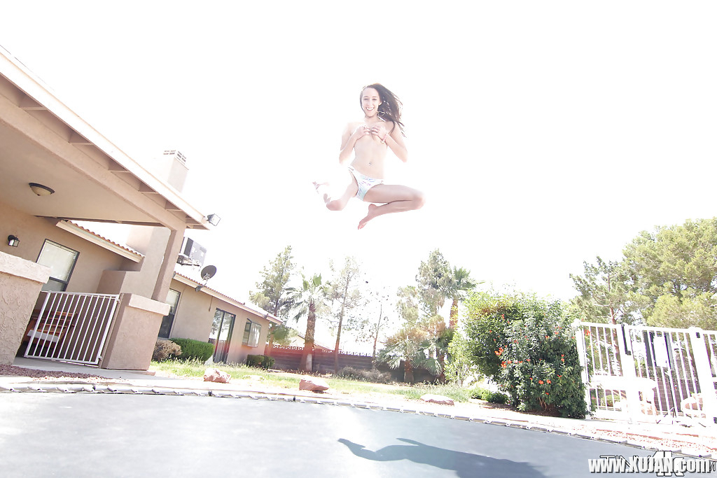 Leggy solo girl Lola Hunter poses outdoors beside swimming pool in bikini - Photo #1824000