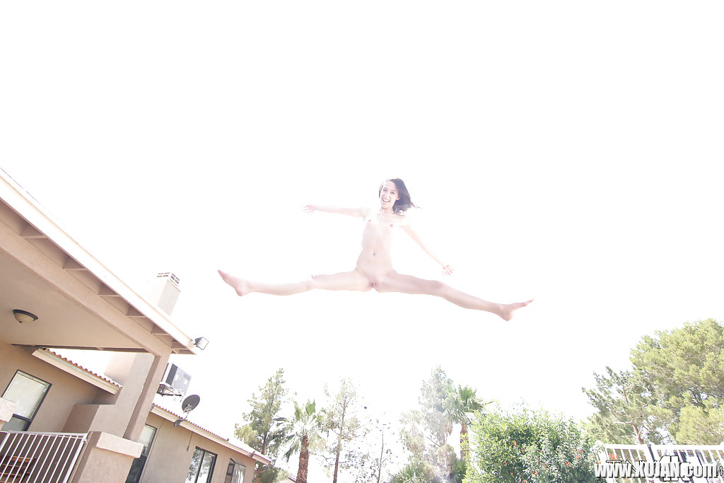 Leggy solo girl Lola Hunter poses outdoors beside swimming pool in bikini - Photo #1824003