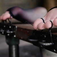 Mercy West in black pantyhose is dungeon bound made to orgasm