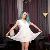 Flexible petite blue haired teen Rebecca Nikson strips and spreads her cunt
