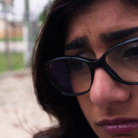 Porn sensation Mia Khalifa takes on two black cocks