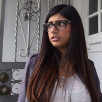 Porn sensation Mia Khalifa takes on two black cocks