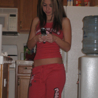 Beautiful teen Kari Sweets in a home routine photoshoot