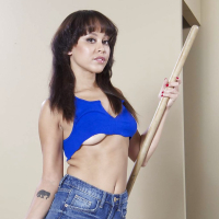 Brunette pornstar Mia Austin exposing MILF pussy underneath denim shorts