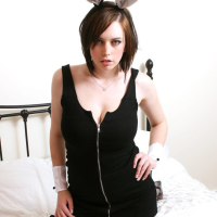 Louisa May shows her big titties and stockings
