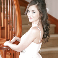 Brunette babe Gia Paige showing off phat panty adorned ass in high heels