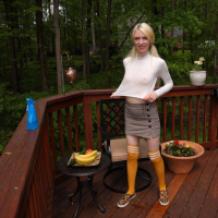 Skinny Celestina Blooms puts a banana between her legs