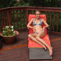 Sasha Sutherland pumps up her clit and spreading cunt