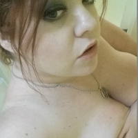 Trinety Guess posing and showing her curvy Body