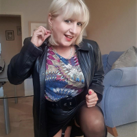 Solo hottie Lorna Blu puts her big round tits on display