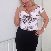 Naughty Lorna Blu having some fun with a big cucumber