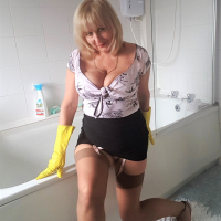 Naughty Lorna Blu having some fun with a big cucumber