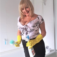 Naughty Lorna Blu having some fun with a big cucumber